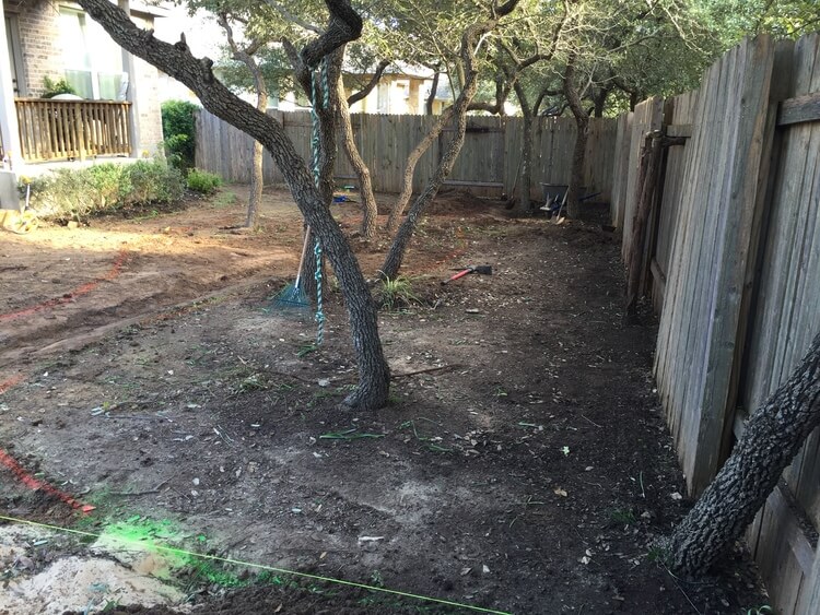 backyard of all dirt that is showing a before image for landscaping purposes